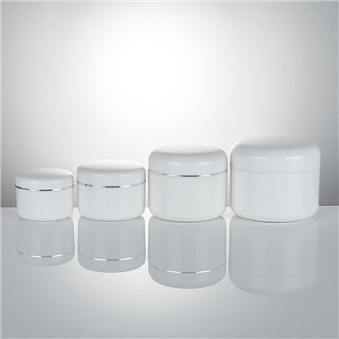 Boîte en plastique de soins de la peau crème ronde blanche